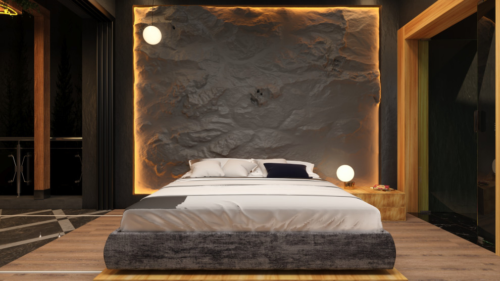 Ejemplo de dormitorio principal minimalista con paredes negras, suelo de contrachapado, chimenea de esquina, marco de chimenea de piedra, suelo multicolor y papel pintado