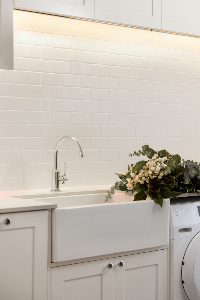 Photo of a transitional laundry room in Sydney.