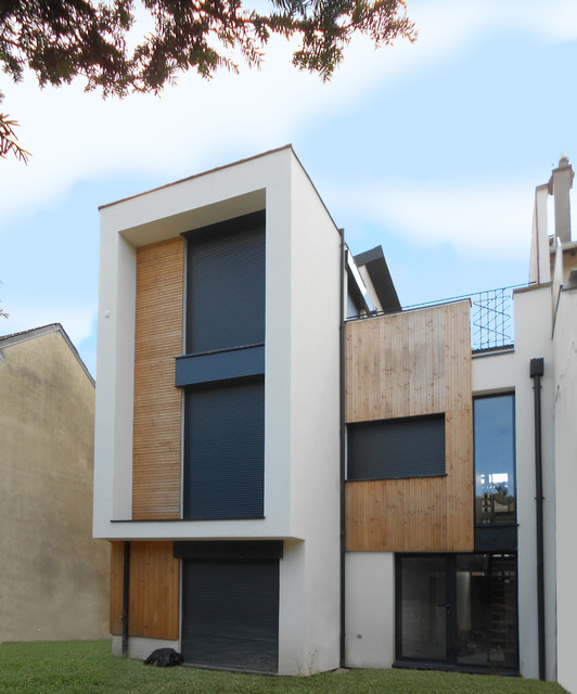 Fa&ccedil;ade c&ocirc;t&eacute; jardin contemporary-fasad