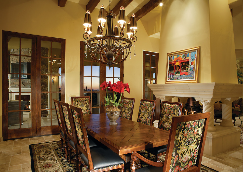 Inspiration for a traditional dining room in Denver with a two-sided fireplace.
