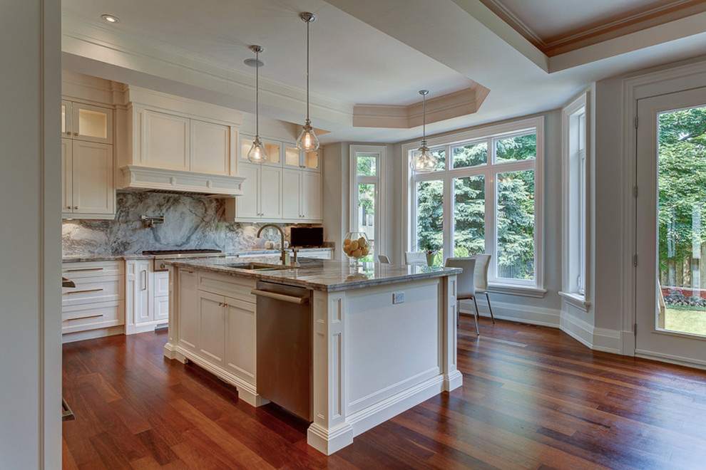 Example of a transitional kitchen design in Toronto