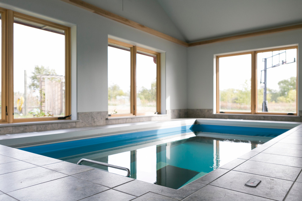 Mid-sized transitional indoor tile and rectangular lap pool house photo