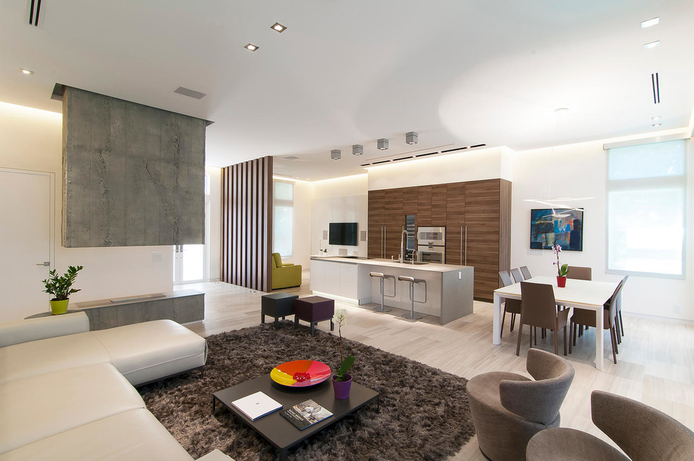 Mid-sized contemporary formal open concept living room in Miami with white walls, a two-sided fireplace, a concrete fireplace surround and a wall-mounted tv.