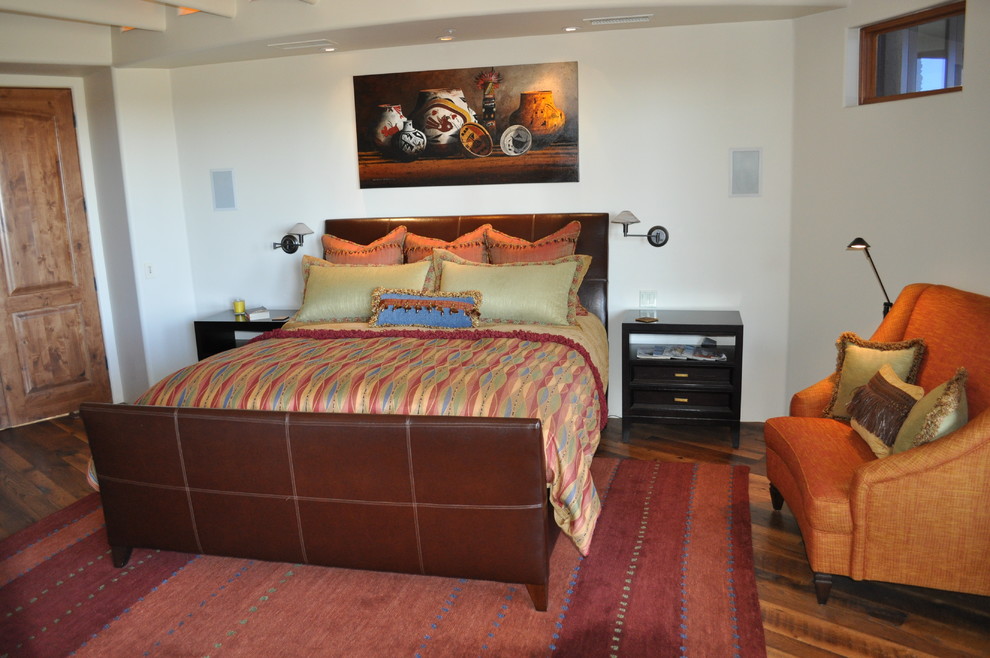 Example of a transitional bedroom design in Orange County