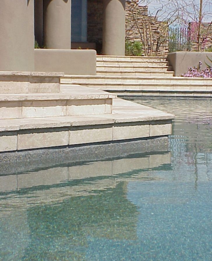 Inspiration for a large mediterranean backyard custom-shaped natural pool in Phoenix with tile.