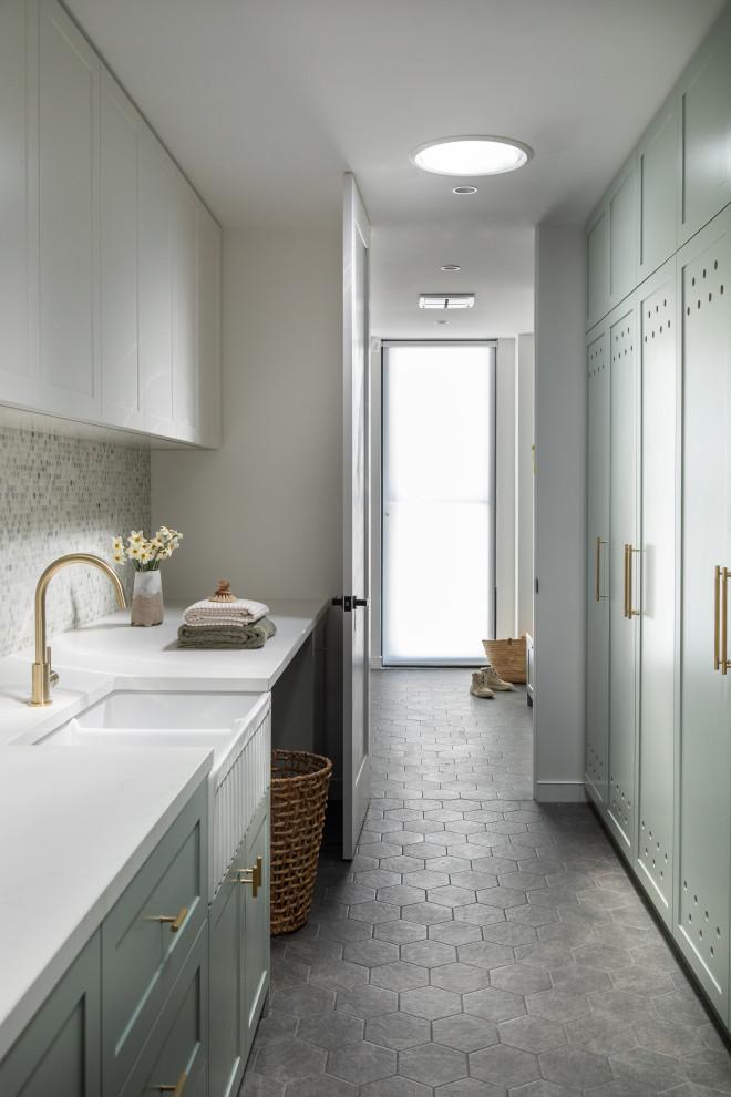 This is an example of a transitional laundry room in Melbourne.