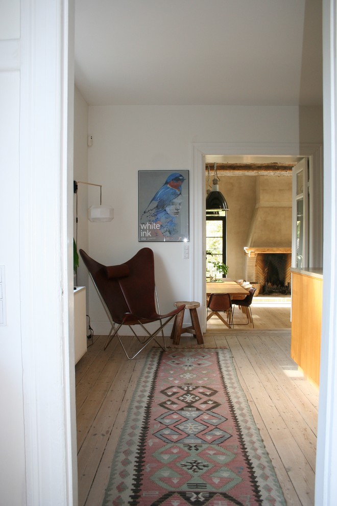Design ideas for a transitional family room in Copenhagen.