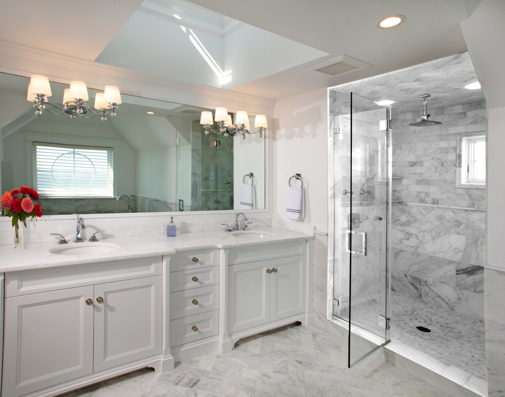 Inspiration for a large beach style master wet room bathroom in Philadelphia with recessed-panel cabinets, white cabinets, a freestanding tub, white walls, marble floors, a trough sink, engineered quartz benchtops, grey floor, a hinged shower door and white benchtops.