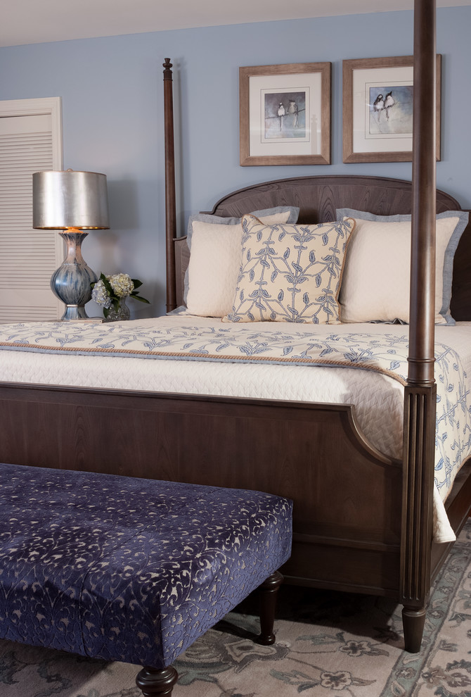 Bedroom - mid-sized transitional master light wood floor and brown floor bedroom idea with blue walls