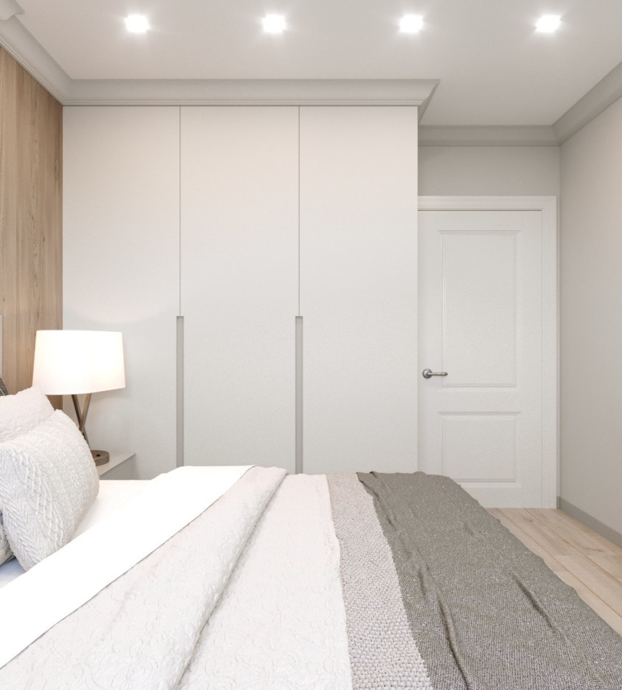 Idées déco pour une chambre parentale contemporaine de taille moyenne avec un mur gris, sol en stratifié et un sol beige.