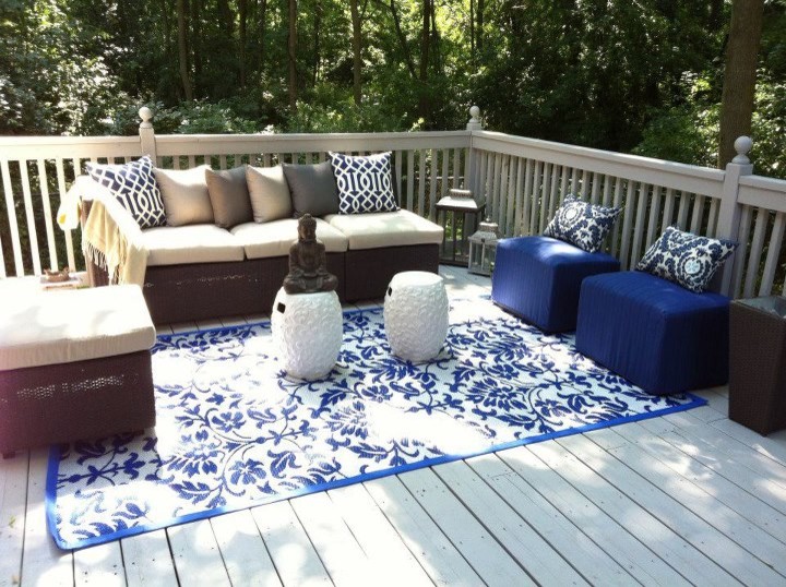 This is an example of a mid-sized contemporary backyard patio in Toronto with decking and no cover.