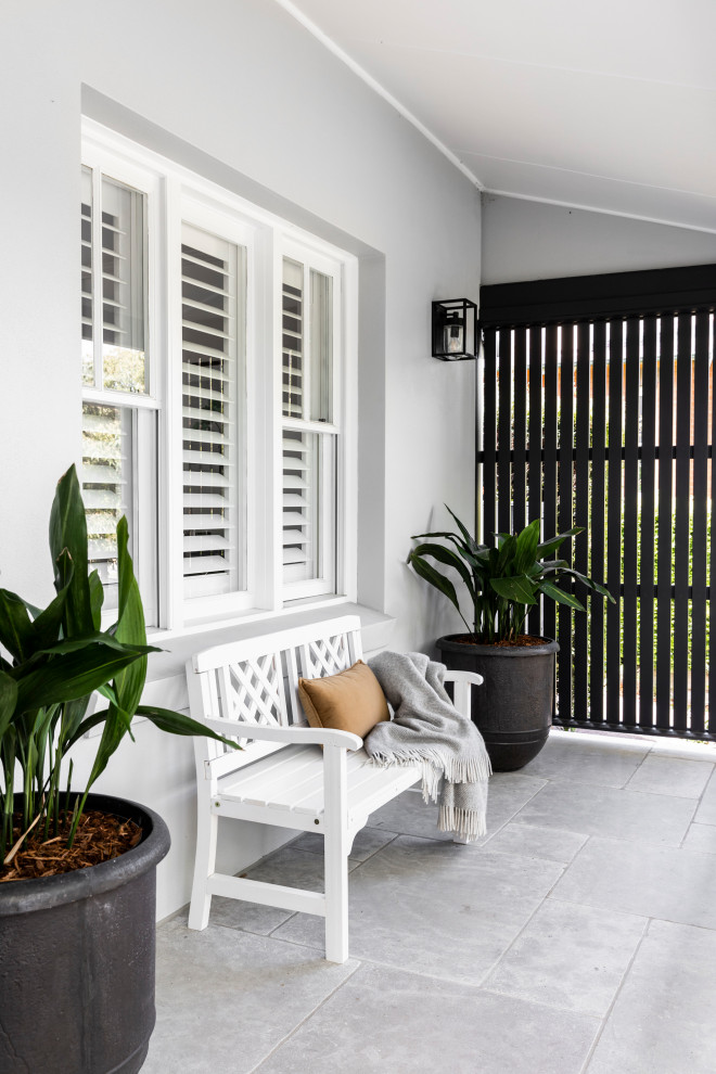 Design ideas for a medium sized traditional balcony in Sydney.