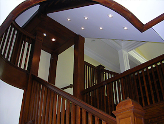 Staircase - mid-sized transitional straight staircase idea in Boston