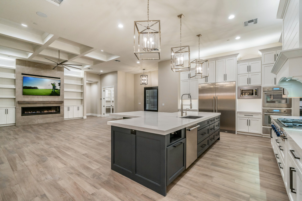 Example of a large minimalist open concept ceramic tile, shiplap ceiling and shiplap wall kitchen design in Phoenix with a bar, white walls, a standard fireplace, a concrete fireplace and a media wall