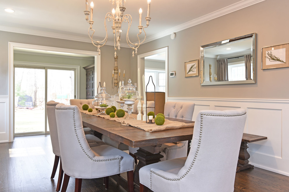 Large transitional separate dining room in Providence with grey walls, medium hardwood floors, no fireplace and black floor.
