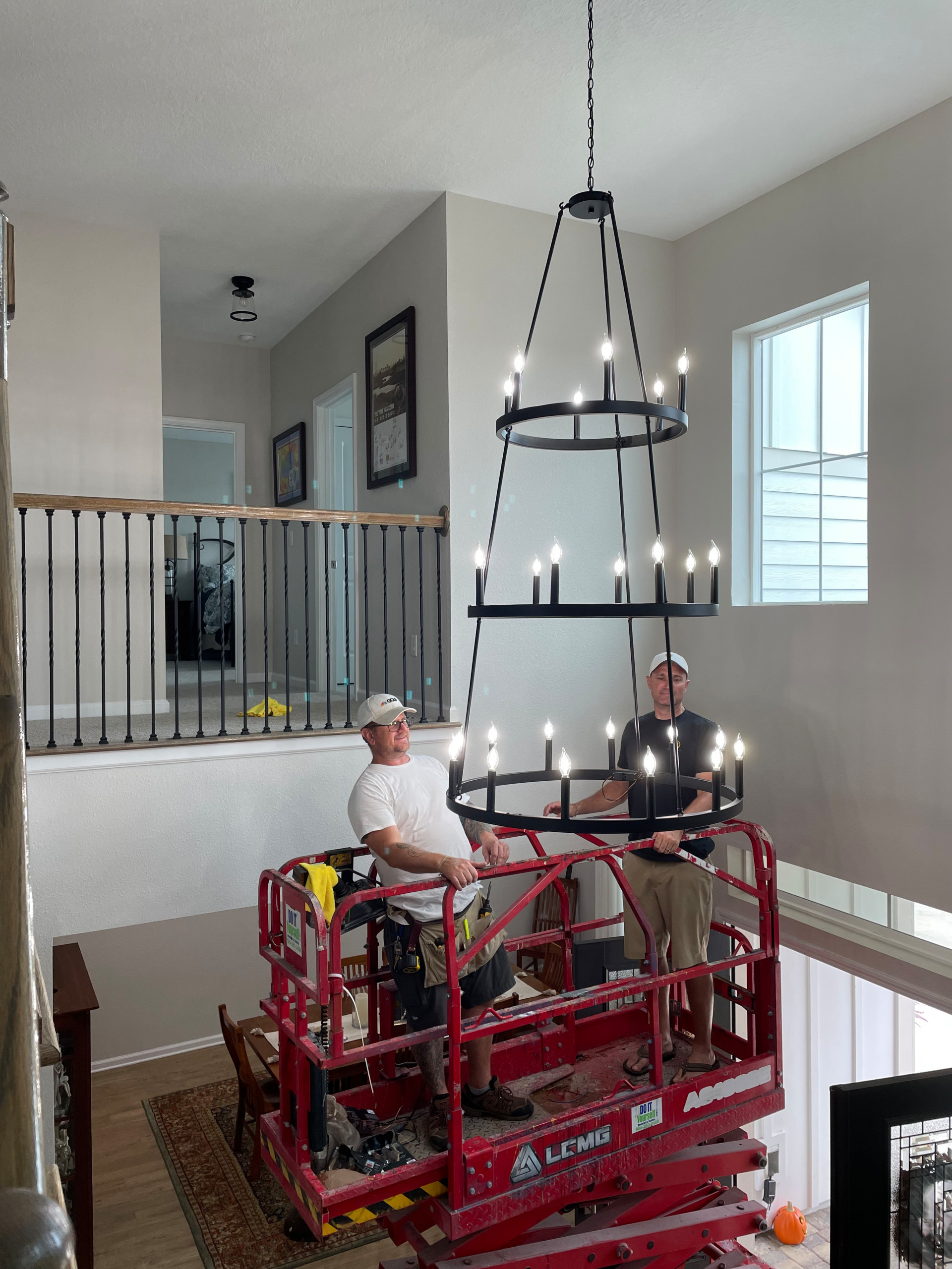 High Chandelier Install With A Lift