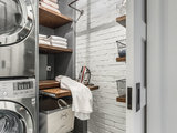 Industrial Laundry Room by Amy Storm & Company