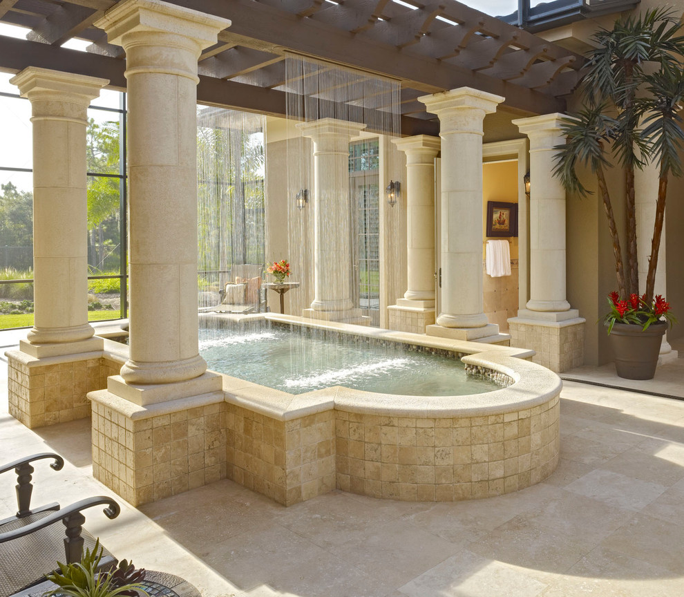 Inspiration for a mediterranean custom-shaped pool in Tampa.
