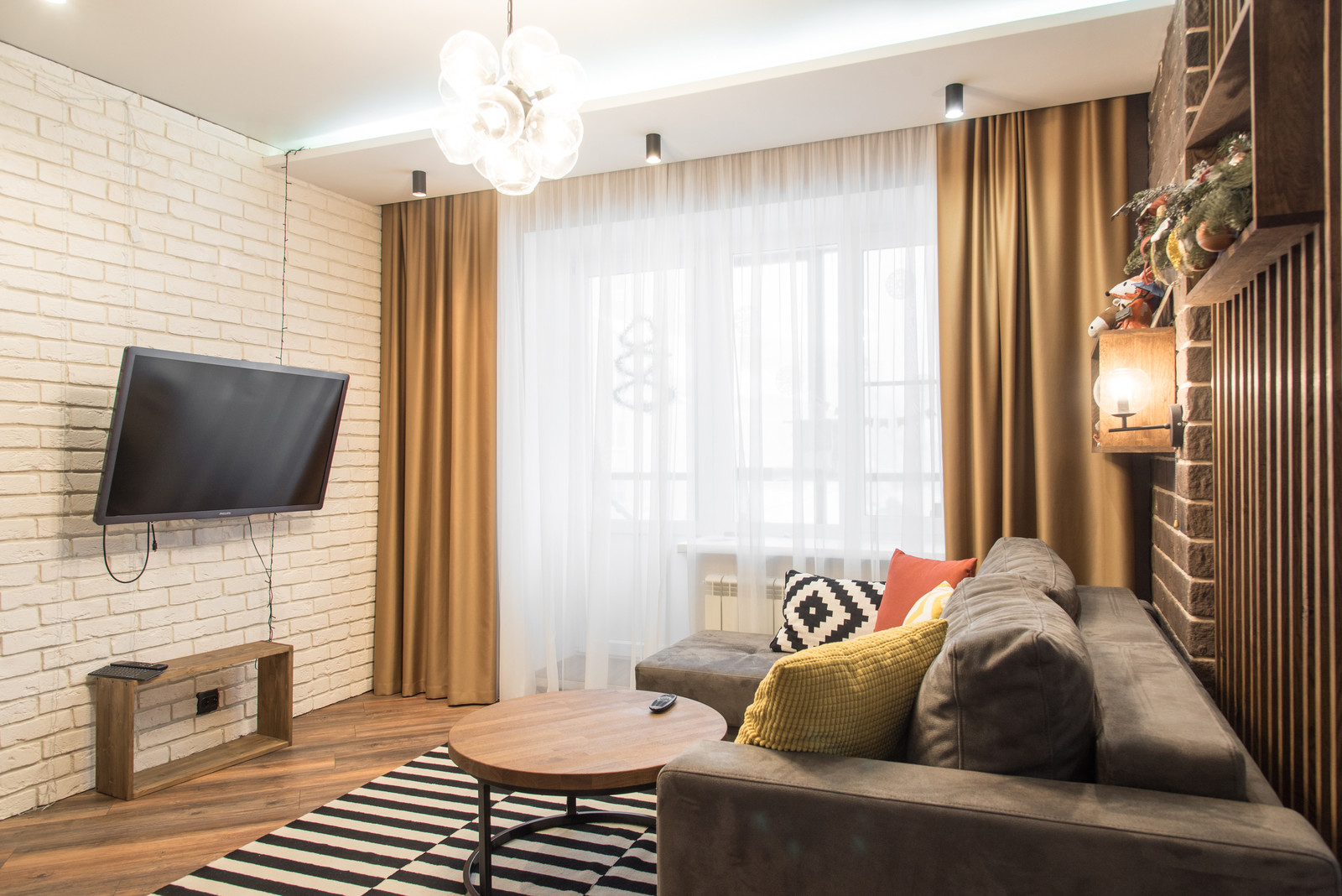 Дизайн интерьера гостиной-кухни для квартиры по пер.Пушкарский