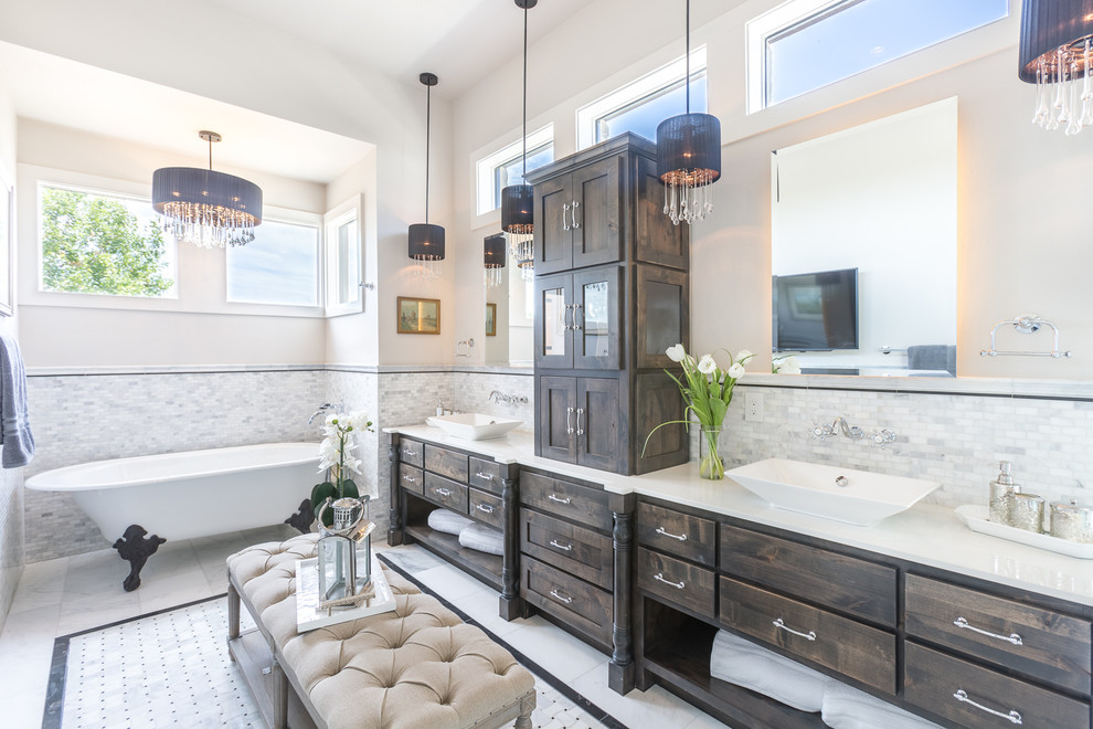 Photo of a traditional master bathroom in Austin with dark wood cabinets, a claw-foot tub, multi-coloured tile, mosaic tile, white walls, a vessel sink, multi-coloured floor, white benchtops and flat-panel cabinets.