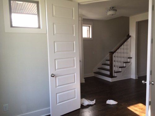 Small (10x10 w/one diagonal wall) home office off foyer/entrance.