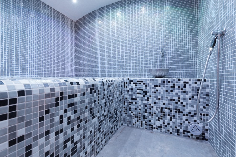 Inspiration for a large contemporary bathroom in Boston with a hot tub, mosaic tile and with a sauna.