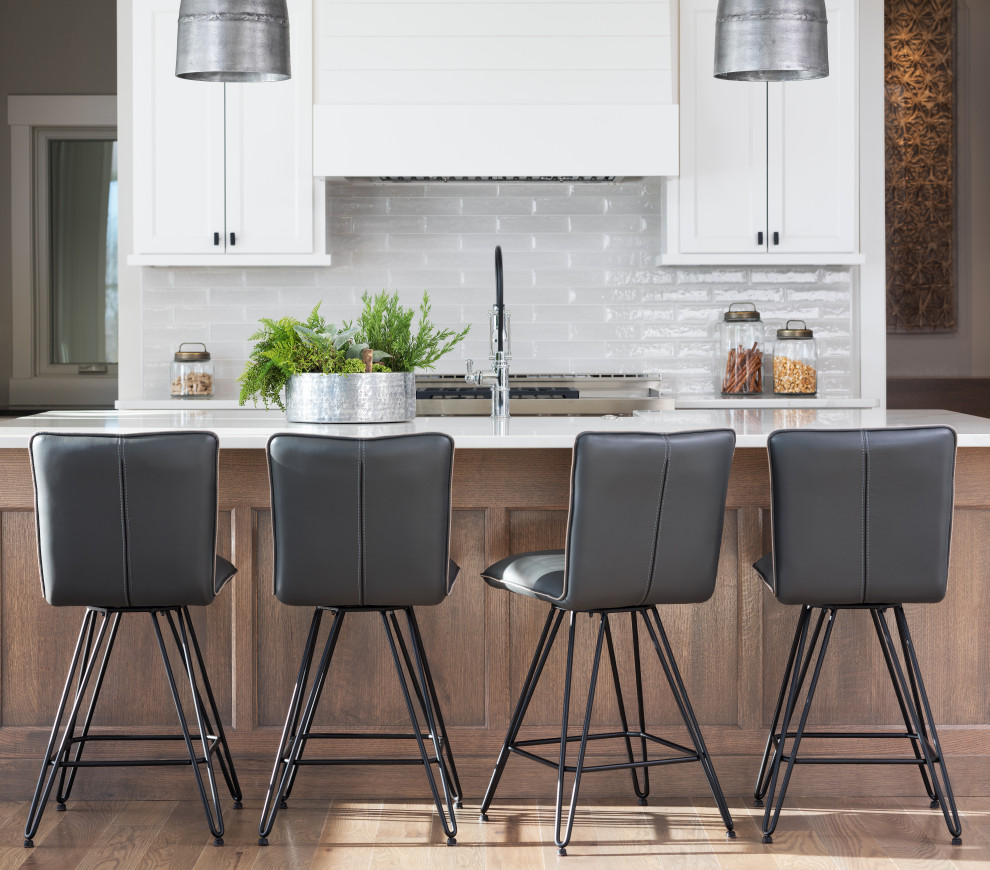 Example of a mid-sized transitional galley light wood floor and beige floor open concept kitchen design in Minneapolis with an undermount sink, shaker cabinets, medium tone wood cabinets, white backsplash, ceramic backsplash, an island and white countertops