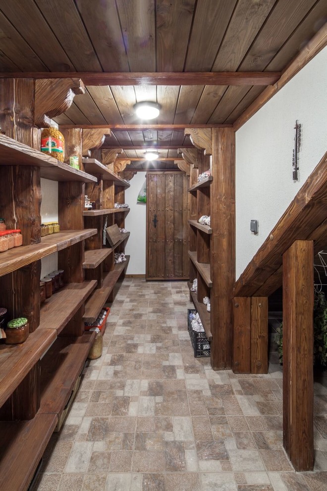 Inspiration for a mid-sized country kitchen in Moscow with ceramic floors.