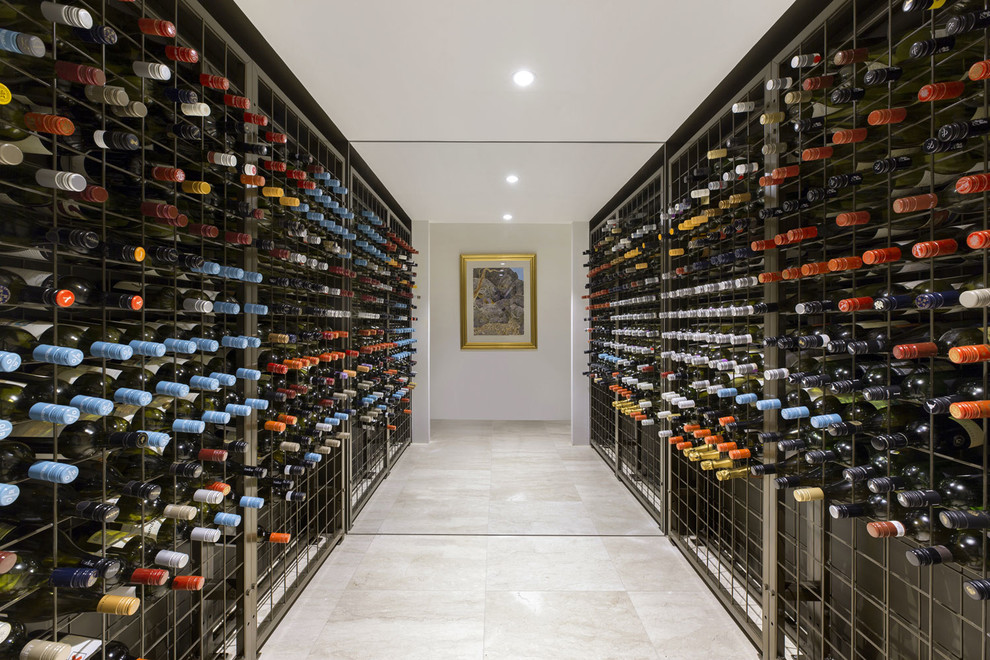 Photo of a mid-sized contemporary wine cellar in Melbourne with marble floors.