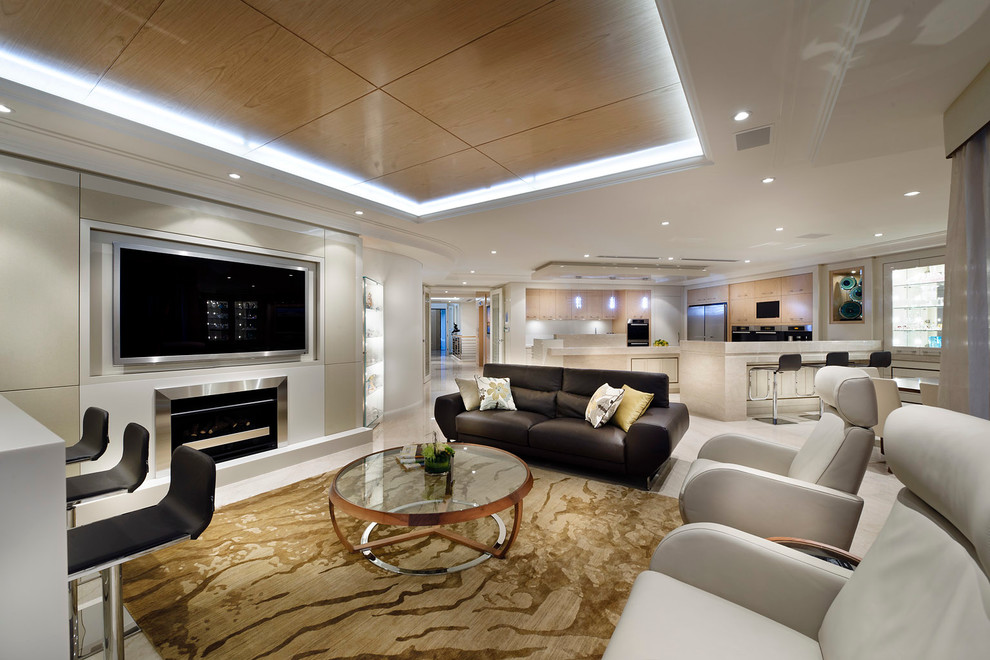 Photo of a contemporary open concept living room in Perth with beige walls and a wall-mounted tv.