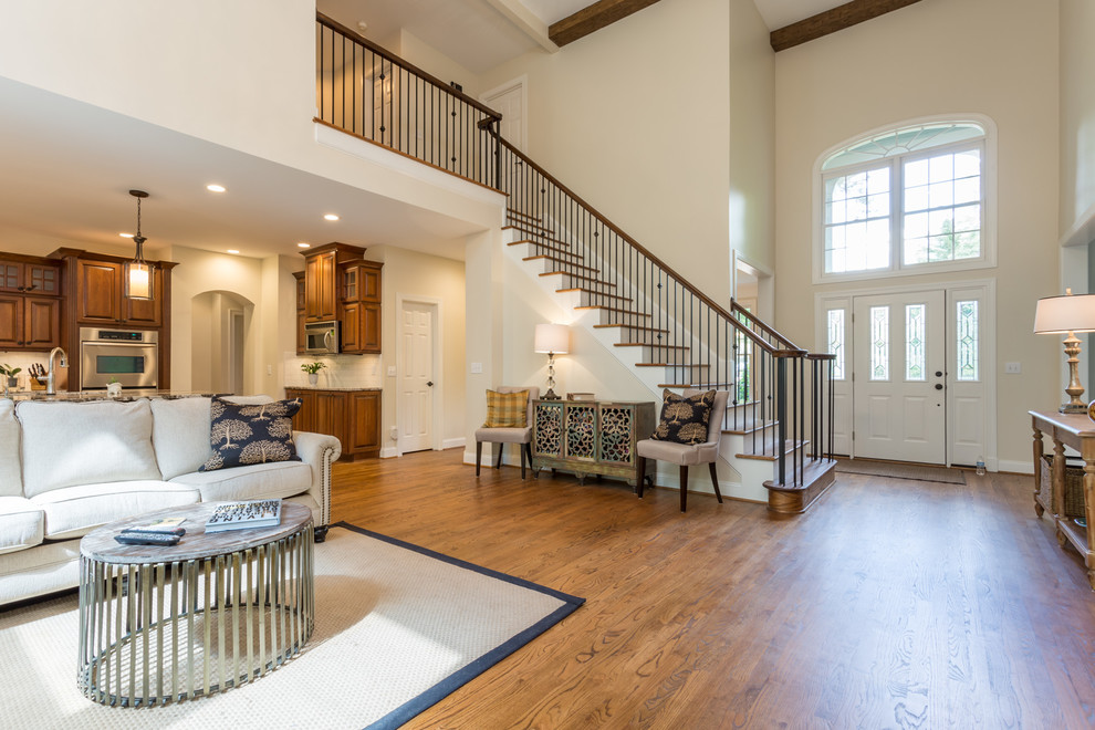 This is an example of a transitional living room in Raleigh.