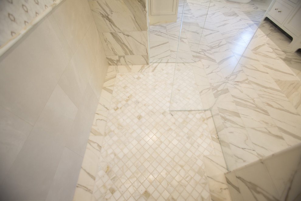 Inspiration for a transitional master white tile and stone tile marble floor home design remodel in Phoenix with recessed-panel cabinets, white cabinets, gray walls, an undermount sink and quartz countertops