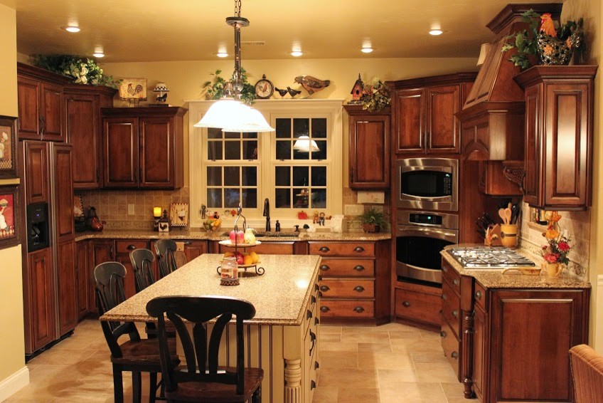 Example of a large minimalist u-shaped ceramic tile eat-in kitchen design with an undermount sink, raised-panel cabinets, medium tone wood cabinets, quartz countertops, beige backsplash, stone tile backsplash, stainless steel appliances and an island