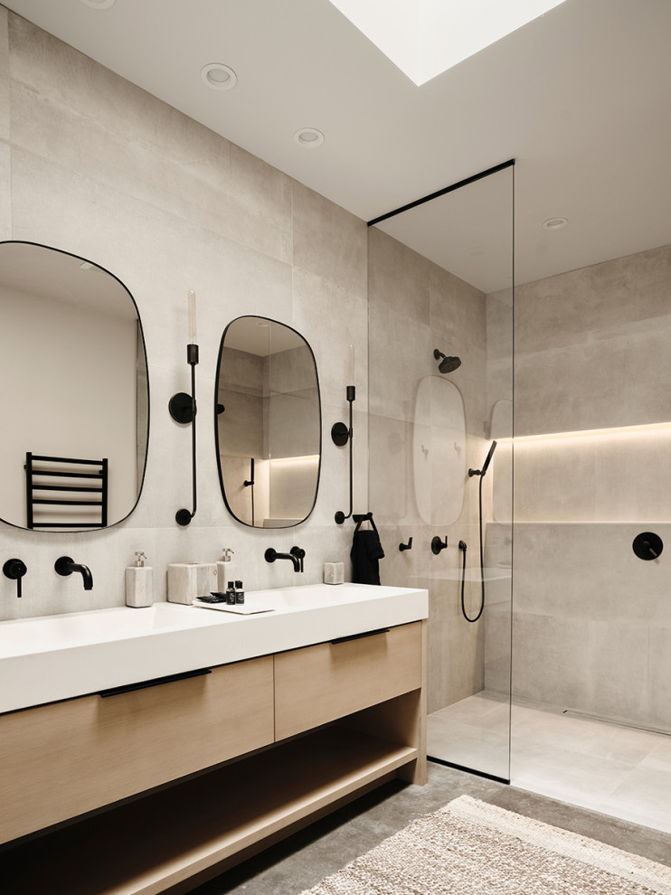 Inspiration for a country ensuite bathroom in Phoenix with flat-panel cabinets, light wood cabinets, a built-in shower, grey tiles, porcelain tiles, concrete flooring, an integrated sink, engineered stone worktops, grey floors, an open shower, white worktops, a wall niche, double sinks and a freestanding vanity unit.
