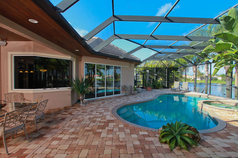 Photo of a traditional pool in Tampa.