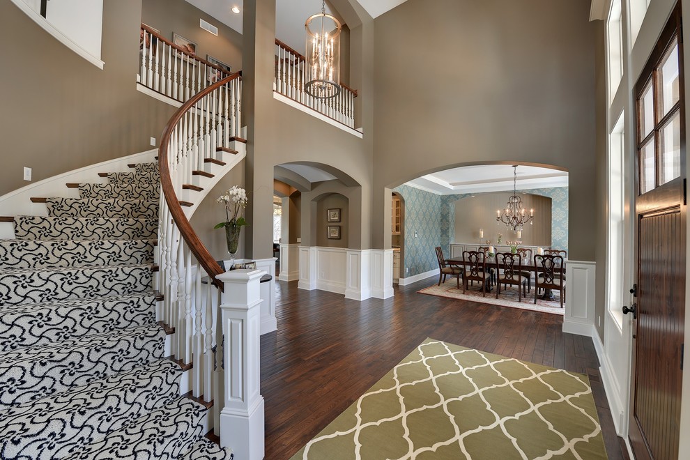 Design ideas for a traditional curved staircase in Minneapolis.