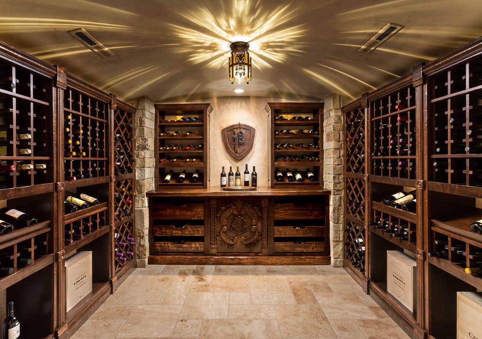 Photo of a traditional wine cellar in Milwaukee with storage racks and beige floor.