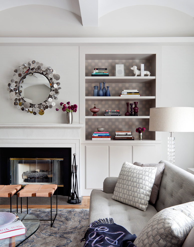 Design ideas for a contemporary living room in New York with a standard fireplace.