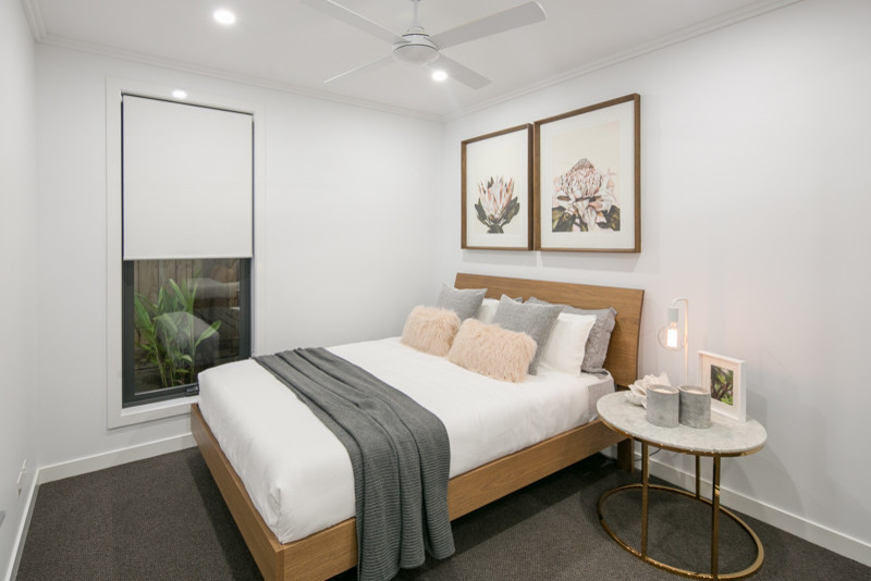 Inspiration for a beach style bedroom in Brisbane.