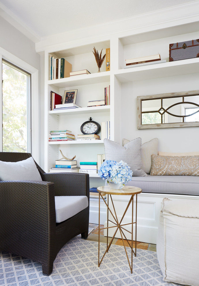 #mcleanrenovation - Calming Sunroom - Calming sunroom with built-in bench seat and storage in soothing shades of beige and blue

Photo by Stacy Zarin Goldberg Photography
