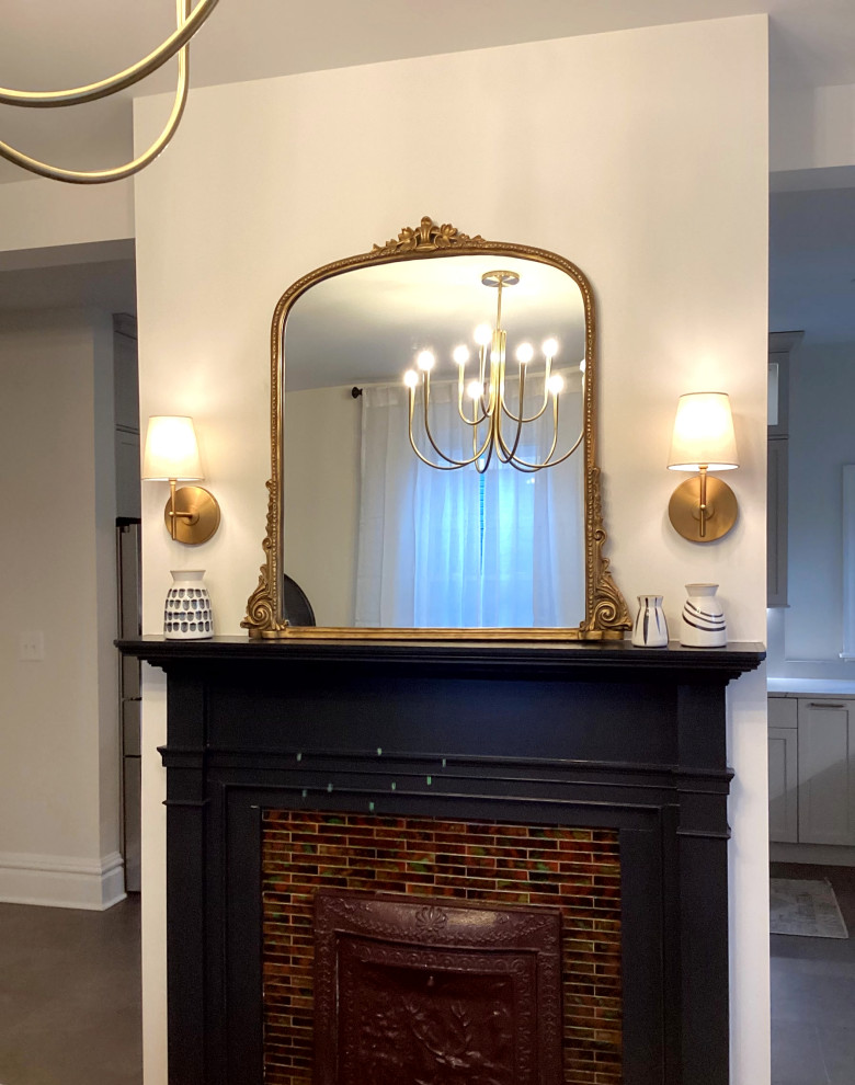 Inspiration for a transitional vinyl floor and gray floor kitchen remodel with an undermount sink, shaker cabinets, gray cabinets, quartzite countertops, stone slab backsplash, stainless steel appliances and an island