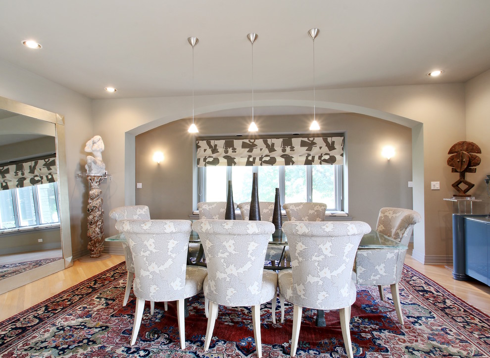 This is an example of an expansive modern dining room in Milwaukee.