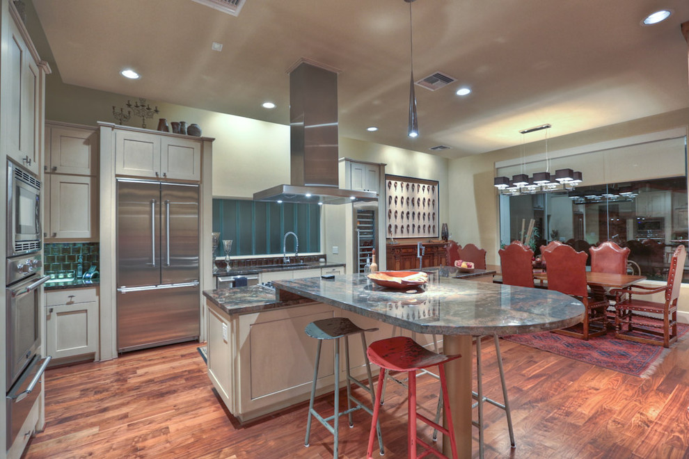 Inspiration for an eclectic kitchen in Houston with granite benchtops and stainless steel appliances.