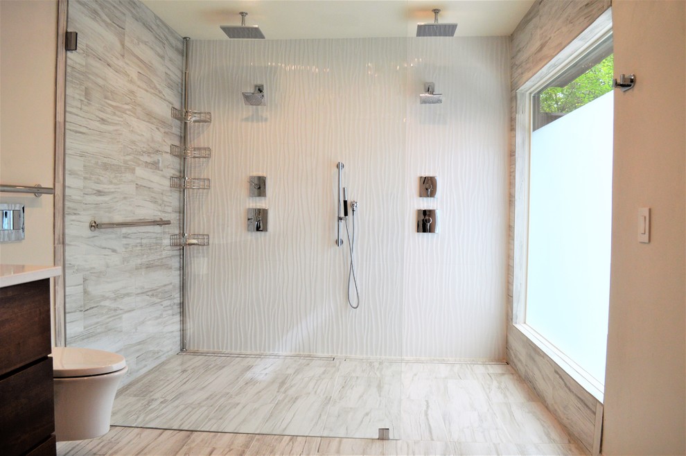 Design ideas for a large modern master bathroom in Milwaukee with flat-panel cabinets, dark wood cabinets, a double shower, a wall-mount toilet, gray tile, white tile, porcelain tile, beige walls, engineered quartz benchtops, grey floor, an open shower and grey benchtops.