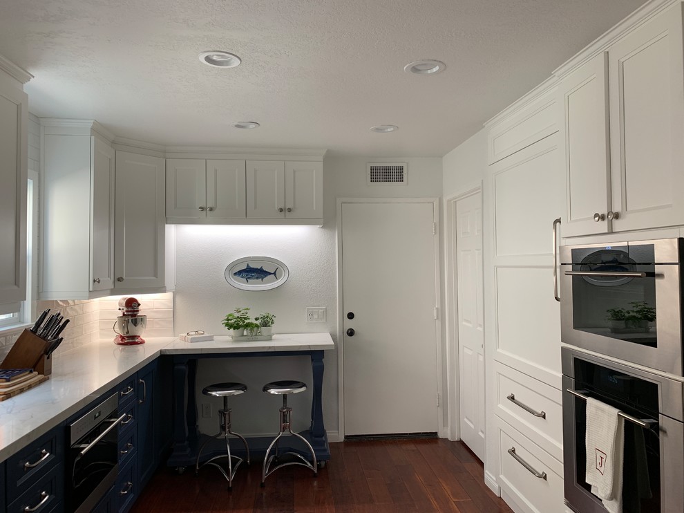 Kitchen - mid-sized transitional galley medium tone wood floor and red floor kitchen idea with a single-bowl sink, shaker cabinets, white cabinets, quartz countertops, white backsplash, cement tile backsplash, stainless steel appliances, no island and white countertops