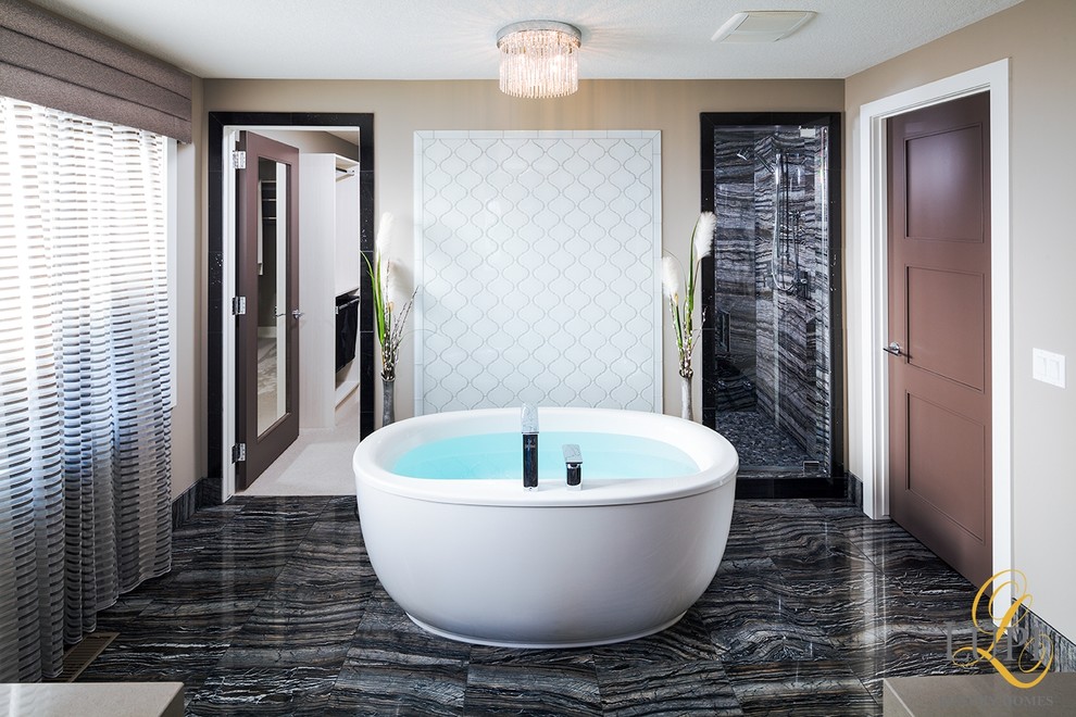 Example of a large transitional master gray tile and porcelain tile marble floor bathroom design in Calgary with an undermount sink, shaker cabinets, dark wood cabinets, quartz countertops, a one-piece toilet and gray walls