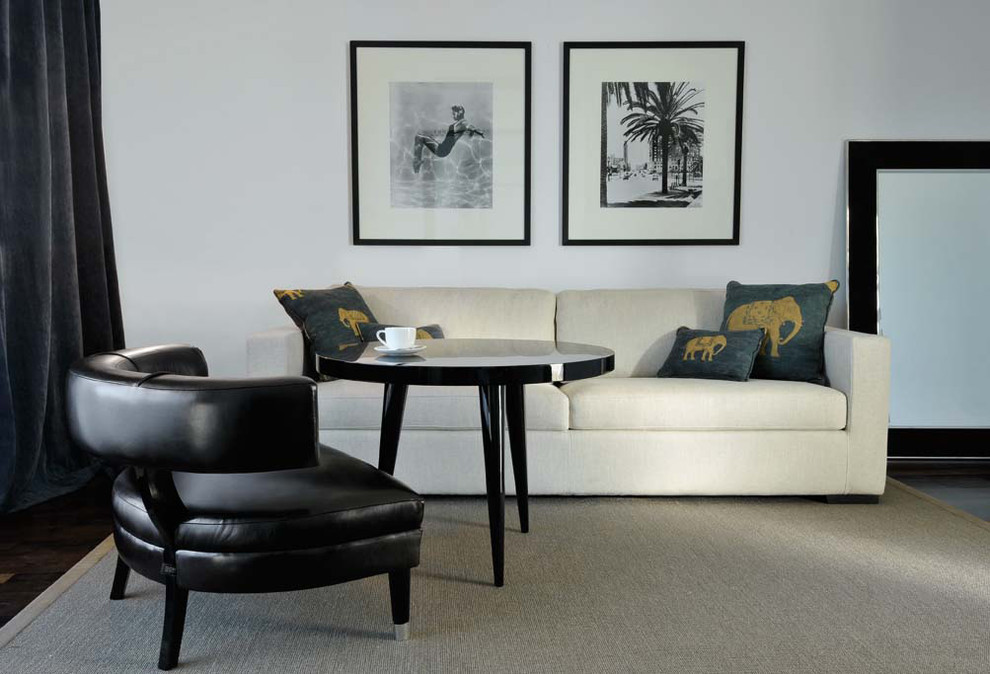 This is an example of a modern living room in Philadelphia with white walls.