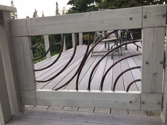 Large arts and crafts backyard deck photo