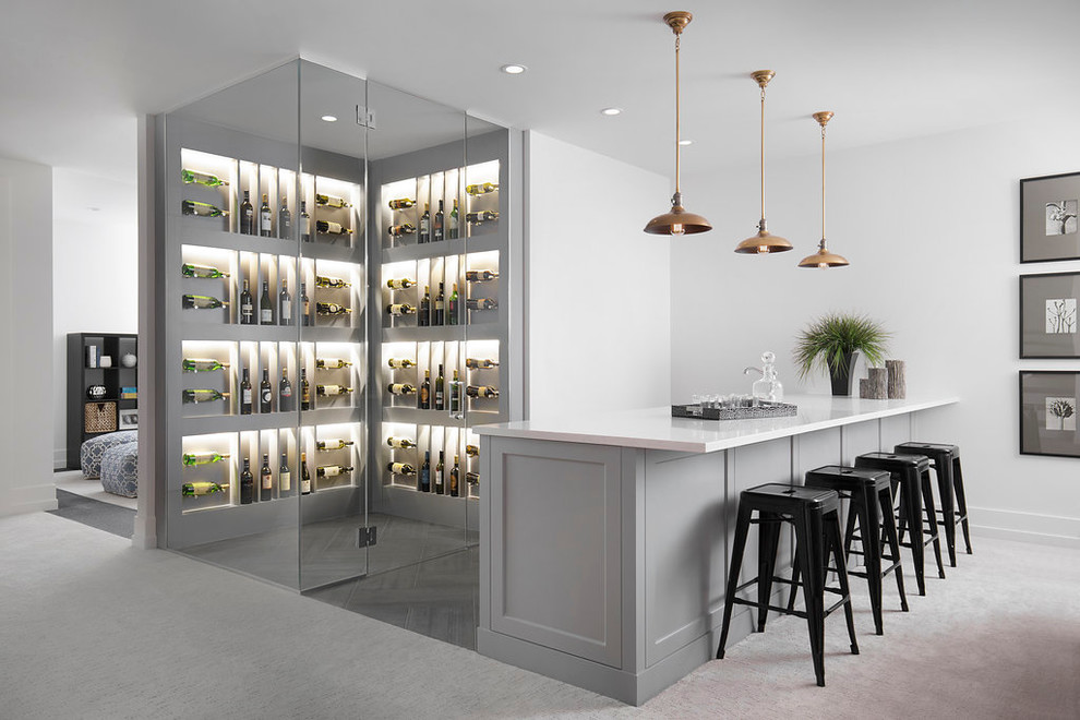 Design ideas for a transitional home bar in Calgary.