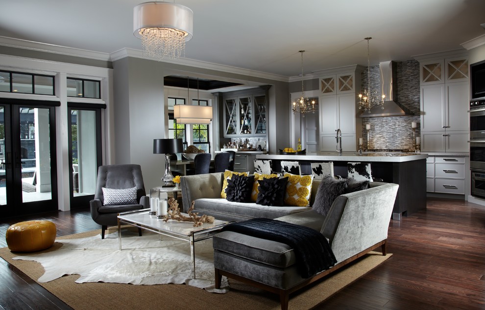 This is an example of a mid-sized transitional formal open concept living room in Miami with grey walls, dark hardwood floors, no fireplace, no tv and brown floor.
